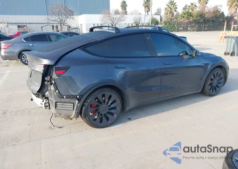 2022 Tesla Model Y Performance Dual Motor All-Wheel Drive from USA, damaged, VIN 7SAYGDEF1NF542447